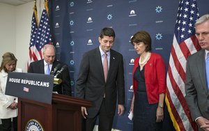 House Speaker Paul Ryan of Wis., center, accompanied by, from left, Rep. Lynn Jenkins, R-Kansas, House Majority Whip Steve Scalise of La., Rep. Cathy McMorris Rodgers, R-Wash., chair of the Republican Conference, and House Majority Leader Kevin McCarthy of Calif., finishes a news conference on Capitol Hill in Washington, Tuesday, Nov. 17, 2015, following a GOP strategy session. Calling this a "moment where it's better to be safe than to be sorry," Speaker Ryan says there should be a "pause" in Syrian refugees coming to the U.S. in the wake of the Paris attacks