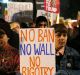 Demonstrators during a protest against Trump's controversial travel ban.