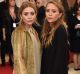 Ashley Olsen (left) and Mary-Kate Olsen, at last year's Costume Institute Gala, have become two of America's most ...