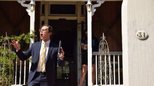 Auctioneer Adam Downes kicking off the auction at 31 Wride Street, Wooloowin.