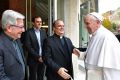 Pope Francis, right, arrives in the village of Ariccia, near Rome, to start a week-long spiritual retreat.