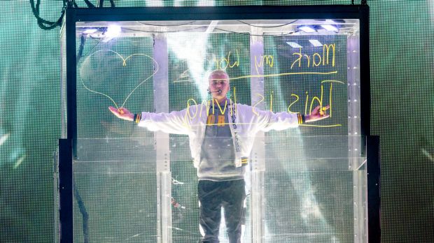 Bieber's isolation seemed to be a theme of the show, as he first appeared in a floating glass box.