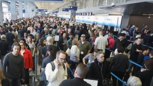 Passengers at O'Hare International Airport in Chicago wait to be screened by the Transportation Security Administration.