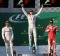 Mercedes driver Nico Rosberg, centre, of Germany, celebrates after winning the Australian Formula One Grand Prix at ...