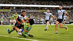 CANBERRA, AUSTRALIA - MARCH 11:  Wade Graham of the Sharks scores a try during the round two NRL match between the ...