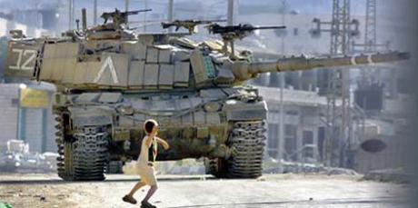 Intifada: a Palestinian boy confronts an Israeli tank