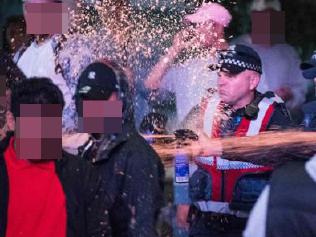 Police use pepper spray at Moomba Festival.