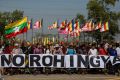 Buddhist chauvinists belonging to the extremist Ma Ba Tha movement protest the use of the word "Rohingya" as a donation ...