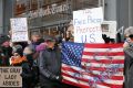 Demonstrators show  solidarity with the press in front of The New York Times building in  February.  