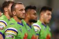 Josh Hodgson of the Raiders and team mates look dejected after a Sharks try.