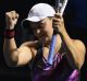 Barty celebrates after winning the Malaysian Open final.