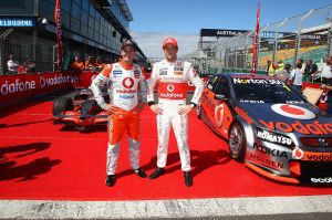 Uneasy alliance: V8s have long featured at the Melbourne Grand Prix, like here with Jenson Button and Jamie Whincup in ...