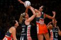 Collingwood's Caitlin Thwaites takes a shot against the Giants.
