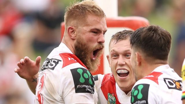 Workhorse: Jack De Belin celebrates his try in round one. 