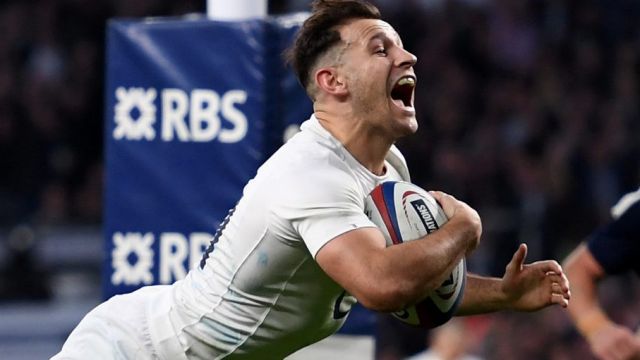 Monster win: Danny Care celebrates one his his two tries for England.