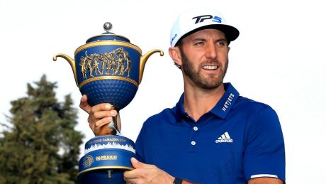 Dustin Johnson with his trophy.