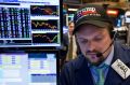 Bullish sentiment: A trader donned a Donald Trump hat while working on Friday on the floor of the New York Stock Exchange. 