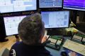 Specialist Anthony Rinaldi works at his post on the floor of the New York Stock Exchange.