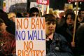 Demonstrators during a protest against Trump's controversial travel ban.