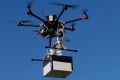 UNSW engineering drone "Flappy" in flight carrying a mock payload.