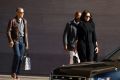 Former President Barack Obama accompanied by former first lady Michelle Obama leaves the National Gallery of Art in ...