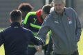 The handshake: Alexis Sanchez and Arsene Wenger settle business at training this week.