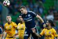 Heading for Victory: Besart Berisha scores for Melbourne.