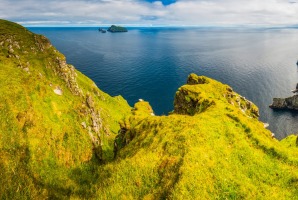 The green pastures and cliffs of St Kilda.