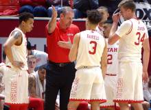 (Leah Hogsten  |  The Salt Lake Tribune)   Utah Utes head coach Larry Krystkowiak talks with his team during the first half. The Utes played their 6th straight game with at least 13 turnovers. University of Utah’s men’s basketball team leads University of Washington, 44-28 at halftime, February 11, 2017 at Utah’s Jon M. Huntsman Center.