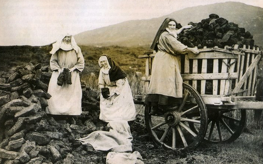 3 Benedictine nuns gathering peat in a bog in Co. Mayo, 1920s.