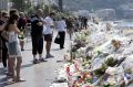 Flowers and messages placed along the beach of the Promenade des Anglais in Nice after the Bastille Day truck attack. 