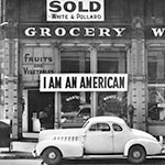 A store owner’s response to anti-Japanese sentiment in the wake of the Pearl Harbor attack, Oakland, Calif., 1942.