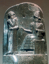 Detail of the stela inscribed with Hammurabi’s code, showing the king before the god Shamash; bas-relief from Susa, 18th century bce; in the Louvre, Paris.