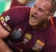 Caption:MELBOURNE, AUSTRALIA - JUNE 17: Matt Scott of the Maroons celebrates scoring a try during game two of the State ...