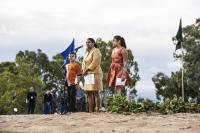 Senator for the Northern Territory Nova Peris addresses the crowd with her children.