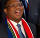 Happier times: South Africa's Minister of Sport and Recreation Fikile Mbalula (centre) holds Durban's 2022 Commonwealth ...