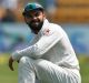 One that got away: Virat Kohli reacts to missing a catch off Matt Renshaw on day two. 