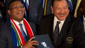 Happier times: South Africa's Minister of Sport and Recreation Fikile Mbalula (centre) holds Durban's 2022 Commonwealth ...