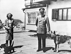 Adolf Hitler, right, and his mistress Eva Braun posing on the Terrace of the Berghof, in Berchtesgeden, Germany