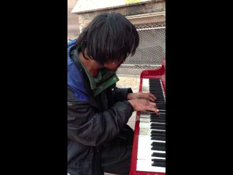 Man on the street plays beautifully