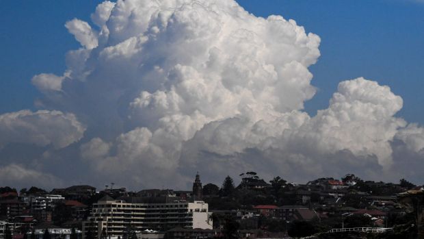 Clouds build over Sydney on Monday as parts of NSW are on a severe weather warning.