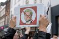 A protester shows his opposition to far-right Dutch politician Geert Wilders as he campaigns in Heerlen.