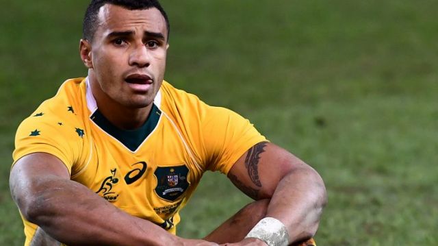 Self inflicted: Will Genia sits dejected after the Wallabies' narrow loss to Ireland.