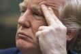 Donald Trump listens during a meeting on health care on Monday.