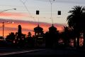 Warm welcome: Sunrise in St Kilda on Wednesday morning. 