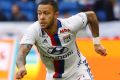 Stunning: Lyon's Memphis Depay scored from halfway in his side's rout of Toulouse.