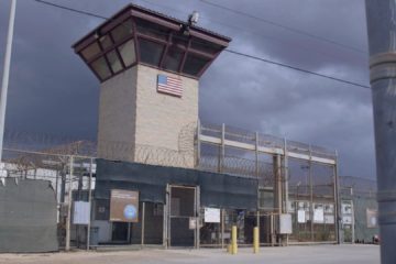 CAPTION: In collaboration with NPR, Out of Gitmo tells the dramatic story of a Gitmo detainee released from the controversial U.S. prison after 14 years, and the struggle over freeing prisoners once deemed international terrorists. Also in this two-part hour, a second segment with Retro Report explores the untold history of the Guantanamo Bay prison. This image shows the outside of Camp VI at the Guantanamo Bay prison. Photo Credit: FRONTLINE 2017