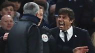 LONDON, ENGLAND - MARCH 13:  Fourth official Mike Jones intervenes as Jose Mourinho manager of Manchester United and ...