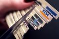 Online, ANZ states that the card "must be cut diagonally in half (including any embedded microchip on the card) and ...