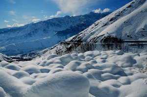 A view of Snow covered road Srinagar-Jammu National heavy near Jawhar Tunnel on January 2017 some 100 Kms from Srinagar, India. At least 20 people including 15 Indian soldiers and five civilians have been killed in snow avalanches in the region in last four days, according to news reports.